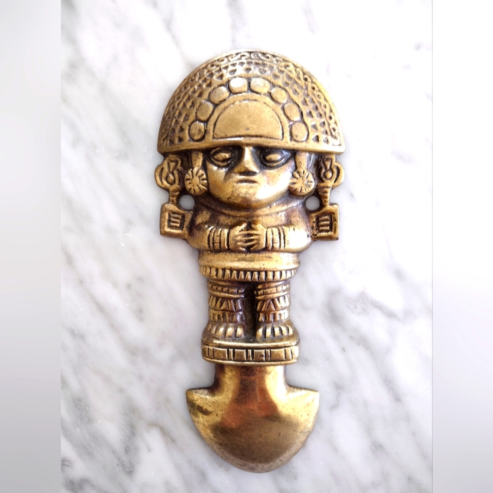 Solid brass wall decor from Peru